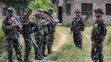 Philippine Army Tech. Sgt. Rernaur Bwenaia, an Explosive Ordnance Disposal (EOD) technician, instructs Philippine Army Soldiers from the 20th Infantry Battalion how to identify improvised explosive devices