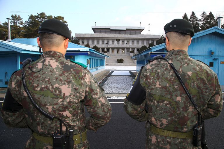 South Korean soldiers guard the DMZ dividing the two Koreas