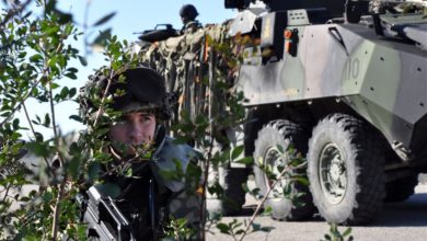 A Spanish marine performs security while conducting convoy training during Exercise LISA AZUL