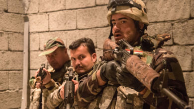 Peshmerga soldiers practice urban room clearing during training at Bneslawa, Iraq