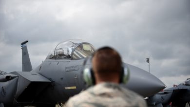 Qatari defense official prepares to fly WSO in F-15E