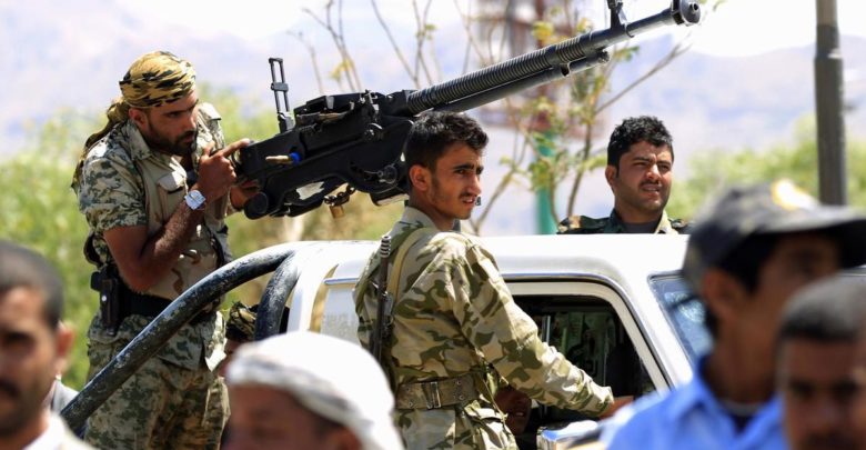 Houthi fighters guard a pro-rebel gathering in Sanaa on September 27, 2018