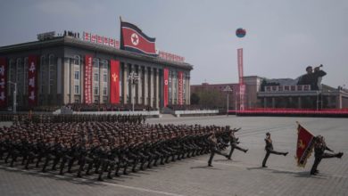 Korean People's Army (KPA) soldiers watch a military parade marking the 105th anniversary of the birth of late North Korean leader Kim Il-Sung, in Pyongyang on April 15, 2017.