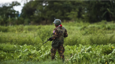 A Myanmar soldier guards an area at the Sittwe airport as British foreign minister Jeremy Hunt arrives in Sittwe, Rakhine state, on September 20, 2018