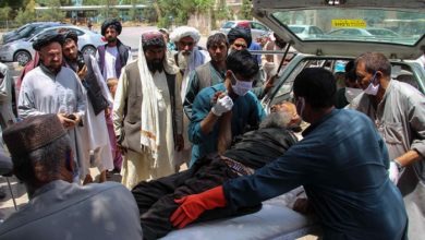 Elderly civilian injured in Sangin marketplace explosions.