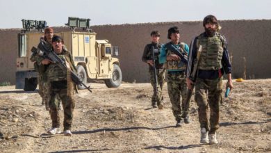 Afghan soldiers patrolling an area in Helmand Province.