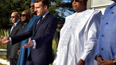 French President Emmanuel Macron (center) gestures during a joint news conference with his counterparts from five Sahel nations in Noukchott, Mauritania