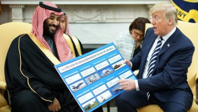 President Donald Trump shows a chart highlighting arms sales to Saudi Arabia during a meeting with Saudi Crown Prince Mohammed bin Salman in the Oval Office of the White House, Tuesday, March 20, 2018.