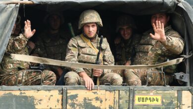 Armenian soldiers on the back of a truck