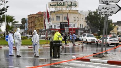 Attackers with knives killed a Tunisian National Guard officer and wounded another before three assailants were shot dead
