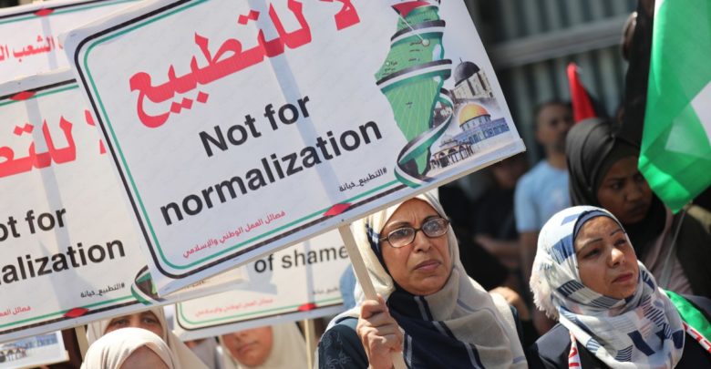 Palestinians gather to protest a deal between the United Arab Emirates (UAE) and Israel to normalize ties in Gaza City, Gaza on August 19, 2020