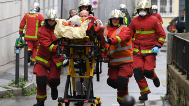 Photo of medical workers in Paris after a knife attack killed two