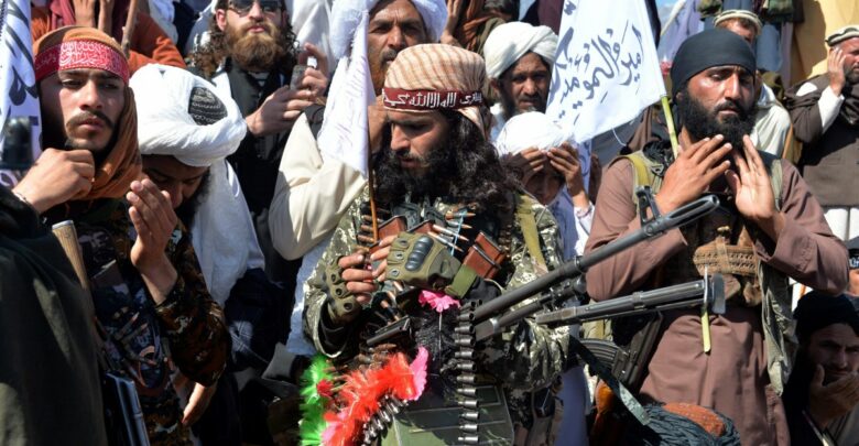 Photo of Taliban militants and villagers attend a gathering to celebrate the peace deal with the US in Afghanistan’s Laghman province on March 2, 2020
