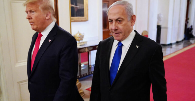 US President Donald Trump and Israel's Prime Minister Benjamin Netanyahu arrive for an announcement of Trump's Middle East peace plan at the White House, January 28, 2020.