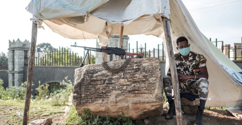 A member of Tigray police is pictured at a checkpoint in the outskirts of Mekele on the day of Tigray's regional elections, on September 9, 2020
