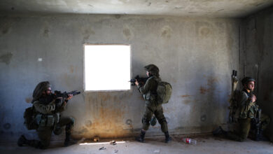 Israeli soldiers of the Golani Brigade take part in an urban warfare drill at a mock village in the Elyakim army base, Northern Israel, May 16, 2017.