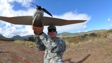 US soldier throwing a PUMA drone.