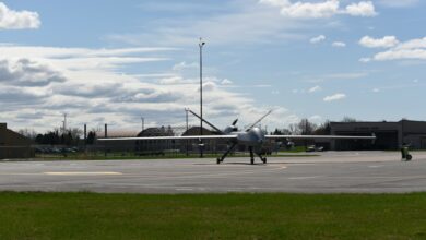 An MQ-9 Reaper with three Ghost Reaper pods attached awaits takeoff at Hancock Field Air National Guard Base, Syracuse, New York.