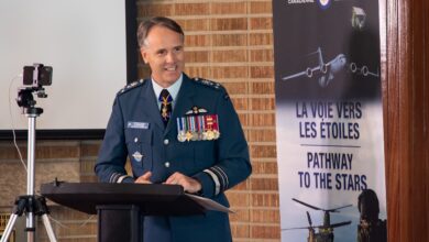 canada air force commander al meinzinger standing during a speech