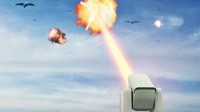 A conceptual image of a laser weapon shooting down drones