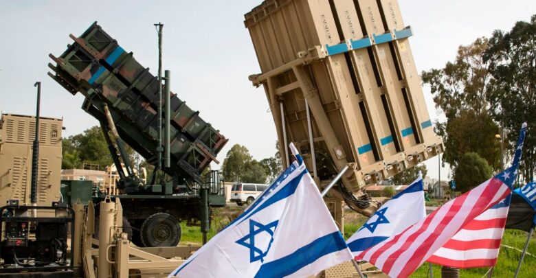 An Israeli Iron Dome anti-rocket system, right, and an American Patriot missile defense system are shown during a joint U.S.-Israel military exercise on March 8, 2018.