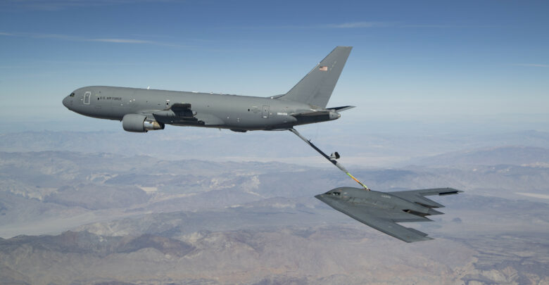 A KC-46 refuels the B-2 for the first time during developmental flight test over Edwards AFB and the Sierra Nevada Mountains in April 2019.