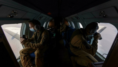 Flying above the Yellow Sea between Korea and China, a French naval crew scans the ocean surface for signs of contraband headed for North Korea