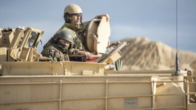 Polish soldier and Idaho National Guard M1 Abrams tank training
