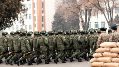 CSTO soldiers attend a ceremony to mark the end of their mission