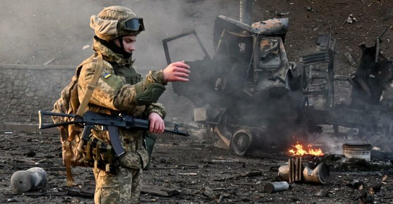 Ukrainian service member seen at the site of fighting with a Russian raiding group