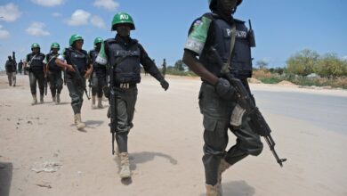 AMISOM soldiers patrol