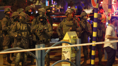 Israeli security forces are pictured at the scene of an attack