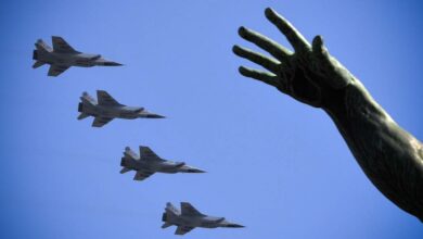 Russian MiG-31BM fighters fly over Red Square in Moscow