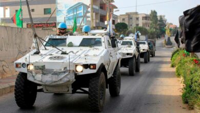 Soldiers for the United Nations Interim Forces in Lebanon patrol the southern Lebanese village of Kfar Kila along the border with Israel