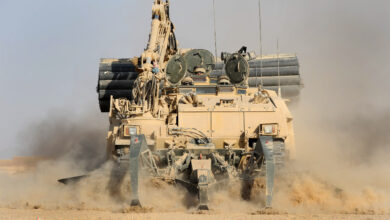 A mighty Trojan Tank belonging to 5 Armoured Engineer Squadron, cuts through the sand on Operation Hamkari in Afghanistan. The AVRE (Armoured Vehicle Royal Engineers) is used in conjuction with other vehicles and the Python weapon system for clearing IEDs (Improvised Explosive Devices). The bulk of British military operations in Afghanistan are concentrated in central Helmand. But Royal Engineers have spent the past two months lending their awesome capabilities to Afghan and US forces clearing a key area of Kandahar province. Since September, 5 Armoured Engineer Squadron, part of 23 Engineer Regiment (Air Assault), have provided close engineering support to the 2nd Battalion of the US ArmyÕs 502nd Regiment, and their partnered Afghan National Army kandak, in KandaharÕs Zharay district. Zharay district contains the Horn of Panjwai, an insurgent stronghold from where attacks on Kandahar City have been enabled and supported, and Sangsar, the Taleban's spiritual birthplace and former home of Mullah Omar. Under this effort, known as Operation HAMKARI - or as the soldiers call it "The Battle of Kandahar" - the intent has been to defeat insurgent elements and increase Afghan government influence across the area, as well as enable development west of Kandahar City.