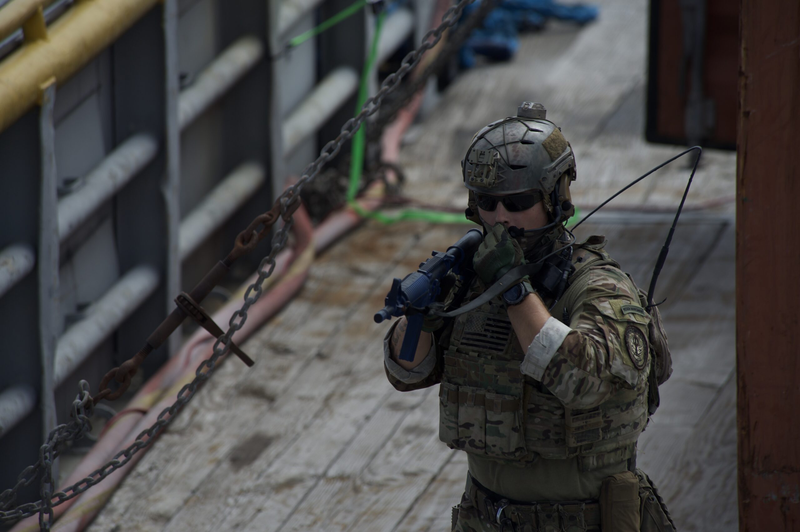 U.S. Coast Guardsmen from the Maritime Security Response Team East simulate interdicting a jammer on a vessel in support of Advanced Battle Management System Onramp 2 in the Gulf of Mexico, Sept. 3, 2020. The effect ABMS is attempting to achieve is Joint All-Domain Command and Control (JADC2). JADC2 is meant to accelerate the speed of the kill chain by connecting sensors to shooters. ABMS is the digital infrastructure which allows a level of connectivity and sensor compatibility for our military at war. As a new Joint Warfighting Concept, Joint All-Domain Operations (JADO) seeks to create simultaneous dilemmas for adversary forces, overwhelming them with too many challenges to counter successfully. (US Air Force photo by Staff Sgt. Haley Phillips)