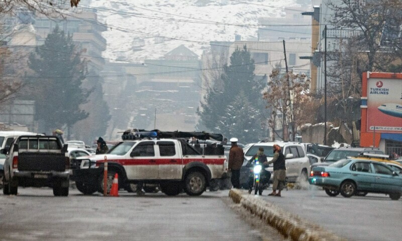 Taliban security forces block a road after a suicide blast near Afghanistan’s foreign ministry at the Zanbaq Square in Kabul on January 11, 2023