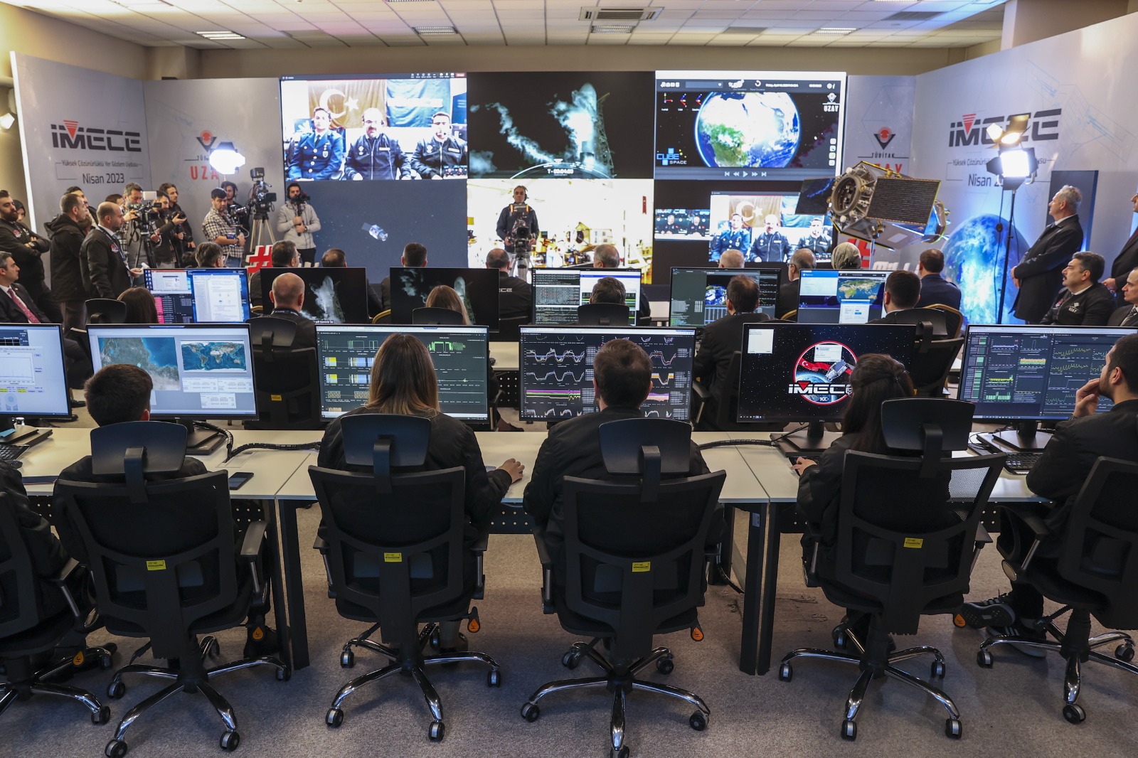 Officials monitoring the launch of Turkey's first indigenous observation satellite, IMECE