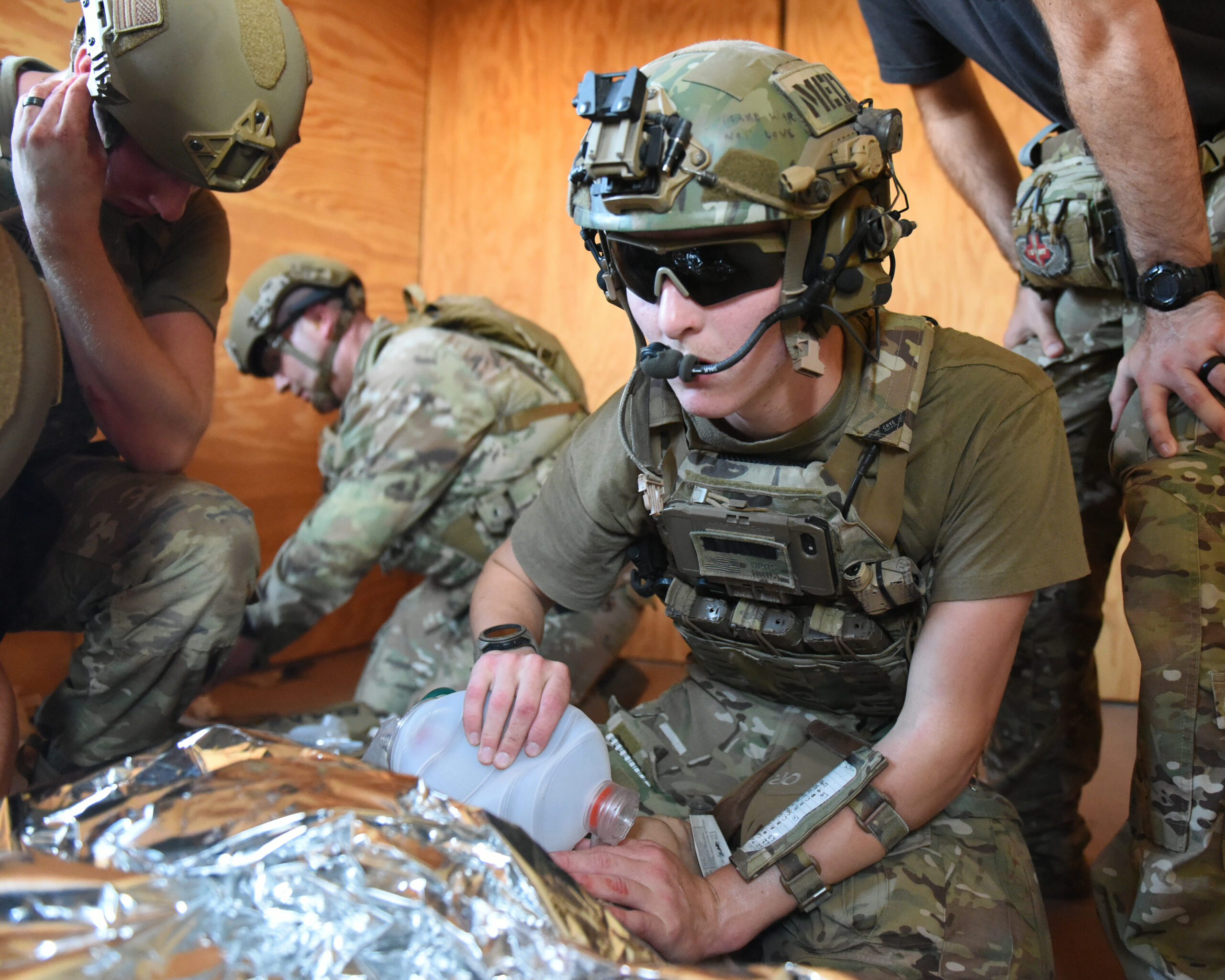 Airman 1st Class Caleb Strout, 17th Operational Medical Readiness Squadron flight medicine admin technician, supplies a simulated casualty with oxygen during a training exercise at Melrose Air Force Range, N.M. Aug. 16, 2022. The Medic Rodeo is designed to test the skills of Air Force medical technicians in both deployed and home installation environments. (U.S. Air Force photo by Airman 1st Class Zachary Heimbuch)