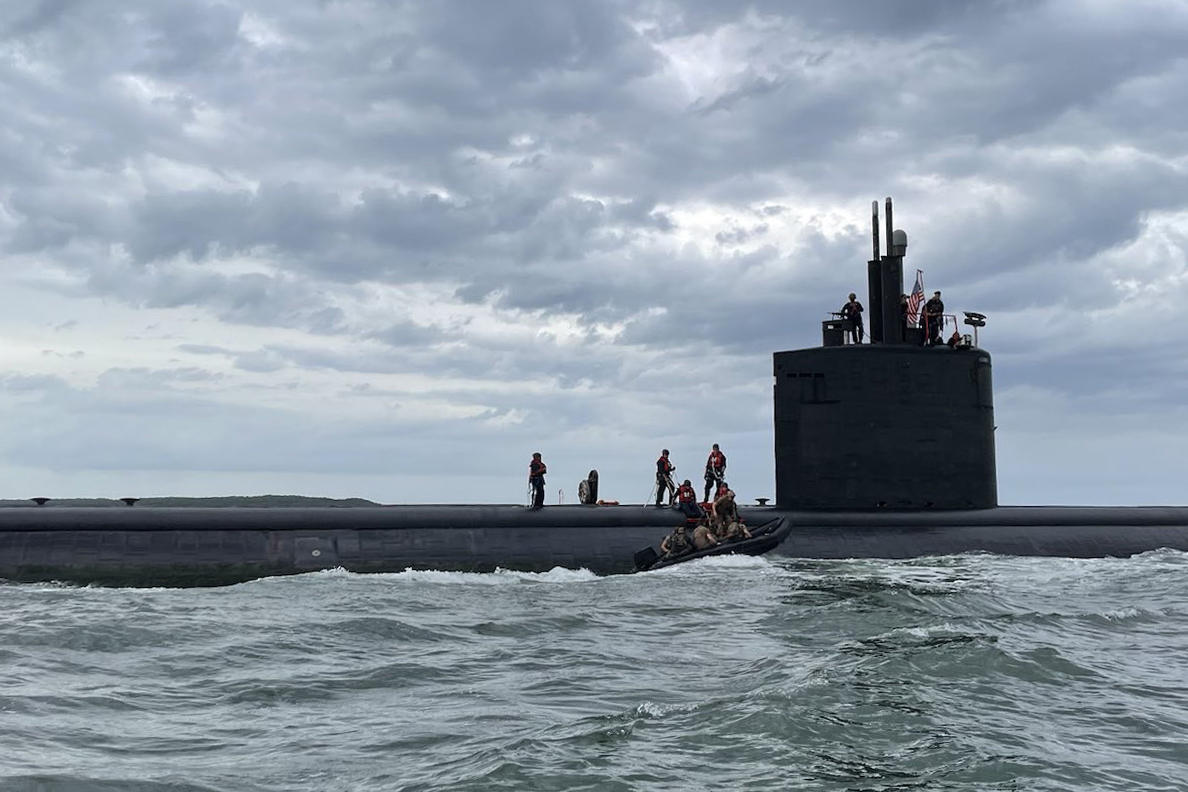 CARTAGENA, Colombia (July 15, 2023) East-coast based U.S. Naval Special Warfare Operators (SEALs) and Colombian special operations personnel drive a combat rubber raiding craft alongside the Los Angeles-class fast-attack submarine USS Pasadena (SSN 752) during UNITAS 2023. Hosted this year by Colombia, UNITAS is the world’s longest-running maritime exercise bringing together multinational forces from 20 partner nations, training in joint maritime operations that enhance tactical proficiency and increase interoperability. Naval Special Warfare Group 2 produces, trains, supports, and deploys the world’s premier maritime special operations commandos to conduct full-spectrum operations and integrated deterrence that support national objectives. (U.S. Navy photo by Mass Communication Specialist 1st Class Bill Carlisle)