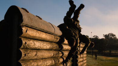 Australian Army recruits from 1st Recruit Training Battalion Kapooka conduct a wall vault during physical training at Blamey Barracks Kapooka, New South Wales. *** Local Caption *** The 1st Recruit Training Battalion Kapooka is the home of the soldier. Australian Army recruits begin their ADF journey at Blamey Barracks in Kapooka, NSW where they are taught mental and physical resilience, military drill, field craft, navigation, teamwork, confidence, and marksmanship.