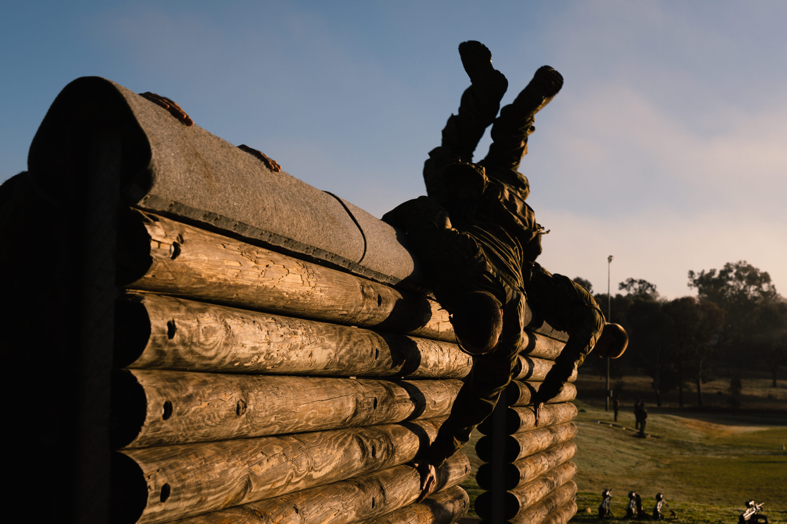 Australian Army recruits from 1st Recruit Training Battalion Kapooka conduct a wall vault during physical training at Blamey Barracks Kapooka, New South Wales. *** Local Caption *** The 1st Recruit Training Battalion Kapooka is the home of the soldier. Australian Army recruits begin their ADF journey at Blamey Barracks in Kapooka, NSW where they are taught mental and physical resilience, military drill, field craft, navigation, teamwork, confidence, and marksmanship.