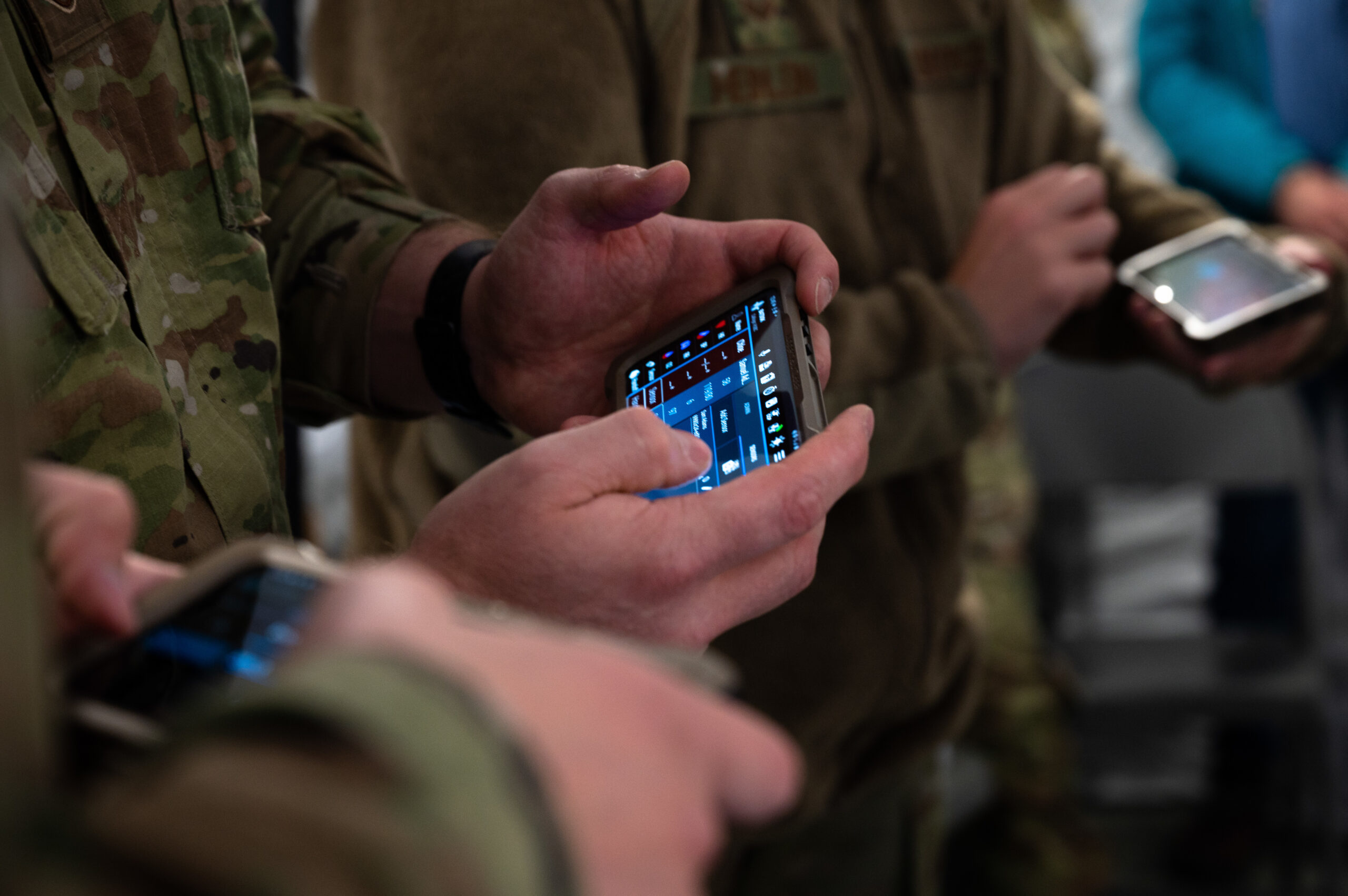 U.S. Airmen assigned to the 354th and 673rd Medical Group use a Battlefield Assisted Trauma Distributed Observation Kit (BATDOK) during a Capabilities-Based Assessment at the Yukon Training Area, Sept. 14, 2021. The BATDOK is a real-time, multi-patient health status monitoring and documentation tool used to integrate patient data into their health records and helps identify exact locations of casualties. (U.S. Air Force photo by Airman 1st Class Jose Miguel T. Tamondong)