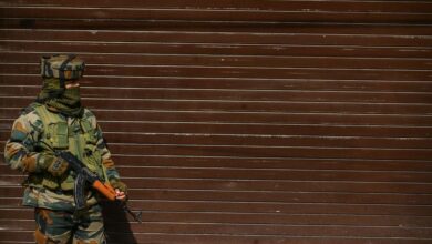 An Indian soldier stands guard in Srinagar, 2022