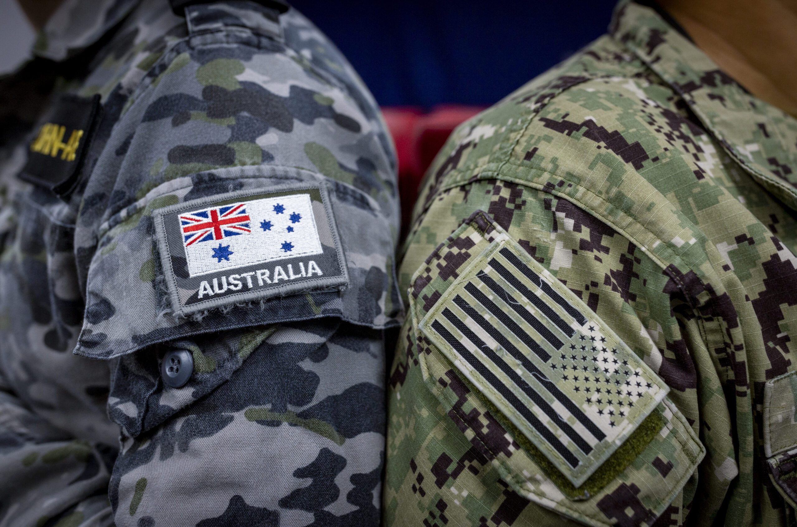 Australian Navy ensign and United States Navy ensign, side by side during Exercise Cyber Sentinels 23. *** Local Caption *** Exercise Cyber Sentinels is an annual cyber exercise which was held 2  13 October 2023 in Canberra. This was the first time this exercise was planned and held at the SECRET//REL Five Eyes level in Australia by the ADF, with previous exercises held by our global partners at a lower classification level. The ADF worked closely with United States Cyber Command (USCYBERCOM) in the planning of this exercise which is part of the global effort sharing of partner cyber readiness. Over 60 US Cyber Command personnel participated alongside over 90 ADF members. The participants were joined by a number of observers from Canada, New Zealand and the United Kingdom. The exercise comprised five blue force teams consisting of three Australian teams from Royal Australian Army 138 Signals Squadron, Royal Australian Air Force 462 Squadron and Royal Australian Navy Fleet Cyber Unit, and two teams from the United States, USFLEETCYBER and MARFORCYBER. Exercise Cyber Sentinels supports the training and development continuum of cyber units by honing individual and collective cyber-based skills. Additionally, the networking and learning opportunities from other nations are benefitting the ADF to further develop in the Cyber Domain and supporting reciprocal training opportunities in the future.