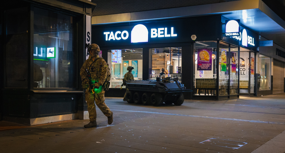 Remote Piloted Vehicles (RPV) is being driven through Swindon town during the exercise to carry Ammunition and resupply troops as well as casualty extraction during LIVEX 23. LIVEX 23 is Experimentation and Trials Group activity which took place in both the urban and rural domains around the Swindon area. 2 Yorks and TDUs exercised with experimental kit and equipment initially in the urban domain, specifically the disused Debenhams store in Swindon, moving into the rural domain on 28 Sept. The Phalanx Platoons concept was trialled for the first time with new kit and equipment on a multi-phase exercise to test the concept which incorporates a systems operator into the platoon to provide situational awareness through the use of uncrewed systems. They also trialled a variety of other innovative kit including uncrewed ground vehicles one of which will be weaponised. Other new kit includes enhanced Dismounted Situational Awareness, STEED and ballistic shields.