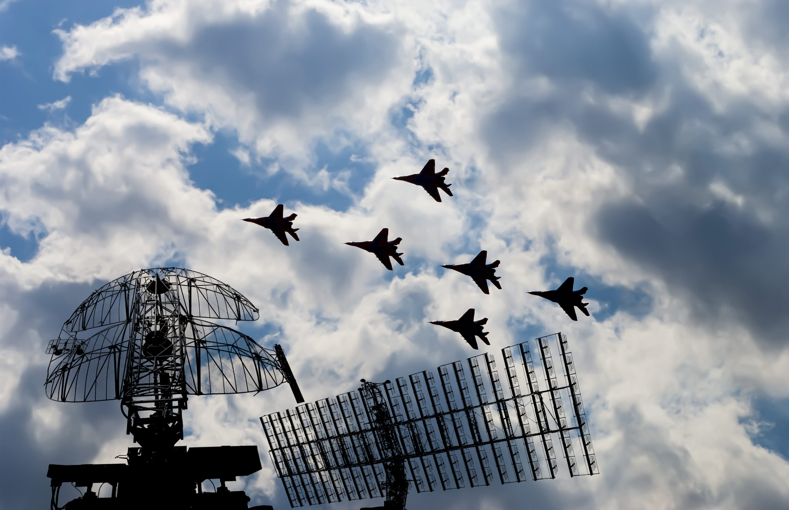 Air defense raiders of military mobile anti-aircraft complexes (radar is designed and automatic tracking of targets and missiles) against the background of the flight of modern combat fighters,Russia