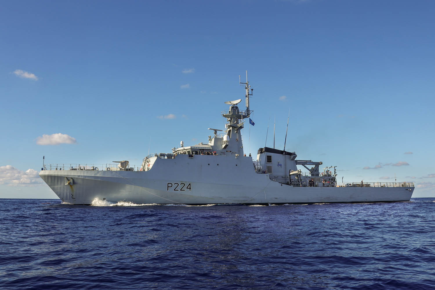 HMS Trent, a UK Royal Navy ship, is seen on the water. "P224" is painted on its grey hull.