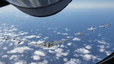A US Air Force B-2 Spirit flies in formation with two Royal Australian Air Force F-35A Lightning IIs, two RAAF F/A-18F Super Hornets, two RAAF EA-18 Growlers, and two US Air Force F-16C Aggressors