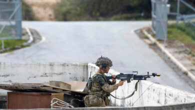 A soldier from C Company, the 1st Battalion Scots Guards watching over their Arcs of fire during the Defensive phase on Exercise IMJIN WARRIOR. Over 120 service personnel from C Company, the 1st Battalion Scots Guards, have deployed to South Korea on Ex IMJIN WARRIOR 23. This joint military exercise aims to develop relationships between the United Kingdom and the Republic of Korea. The exercise takes its name from the Battle of the Imjin River, a decisive battle in the Korean War that remains a significant event in British military history. Over 2,000 personnel from both countries participated in Ex IMJIN WARRIOR 23, working together to improve the partnership between the two militaries. 2023 marks 70 years since the end of the Korean War and 140 years of UK-Korea relations. The exercise demonstrates the UK's enduring commitment to enhancing Indo-Pacific security by shifting greater resources to the region. The Ex coincided with Baroness Goldie's ministerial visit to Seoul for the UK-Korea Strategic Defence Dialogue, providing an opportunity to identify new avenues for cooperation. Over the past 18 months, C Company, also known as 'The Rabbits', has been deployed around the globe, including the Falklands, Gibraltar, and Oman. At the end of the exercise, C Company had the opportunity to conduct a number of cultural visits, including a tour of the DMZ and a visit to the Gloster Hill War Memorial at the exercise's namesake in Imjin. This was particularly poignant for a number of the soldiers in C Company whose relatives had fought in the battle.